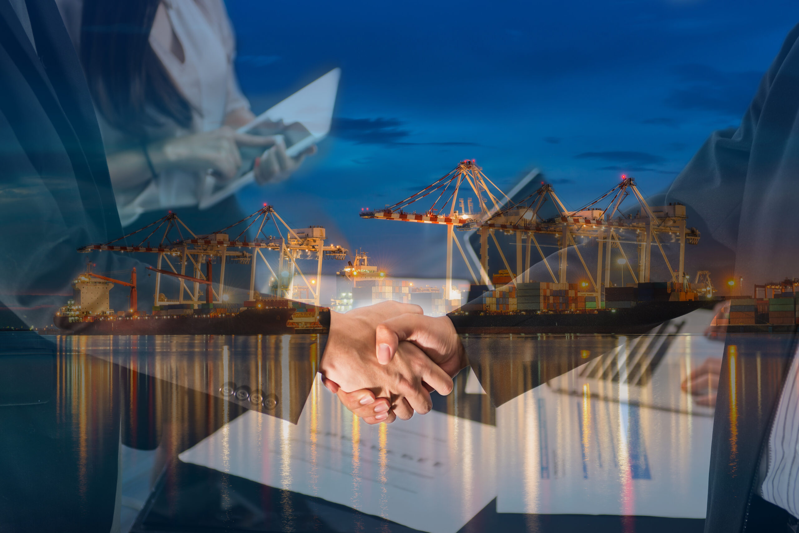 double exposure of a businessman handshake on the industrial port with containers background. concept of business agreement of industrial port, shipping, transportation, logistic import export.